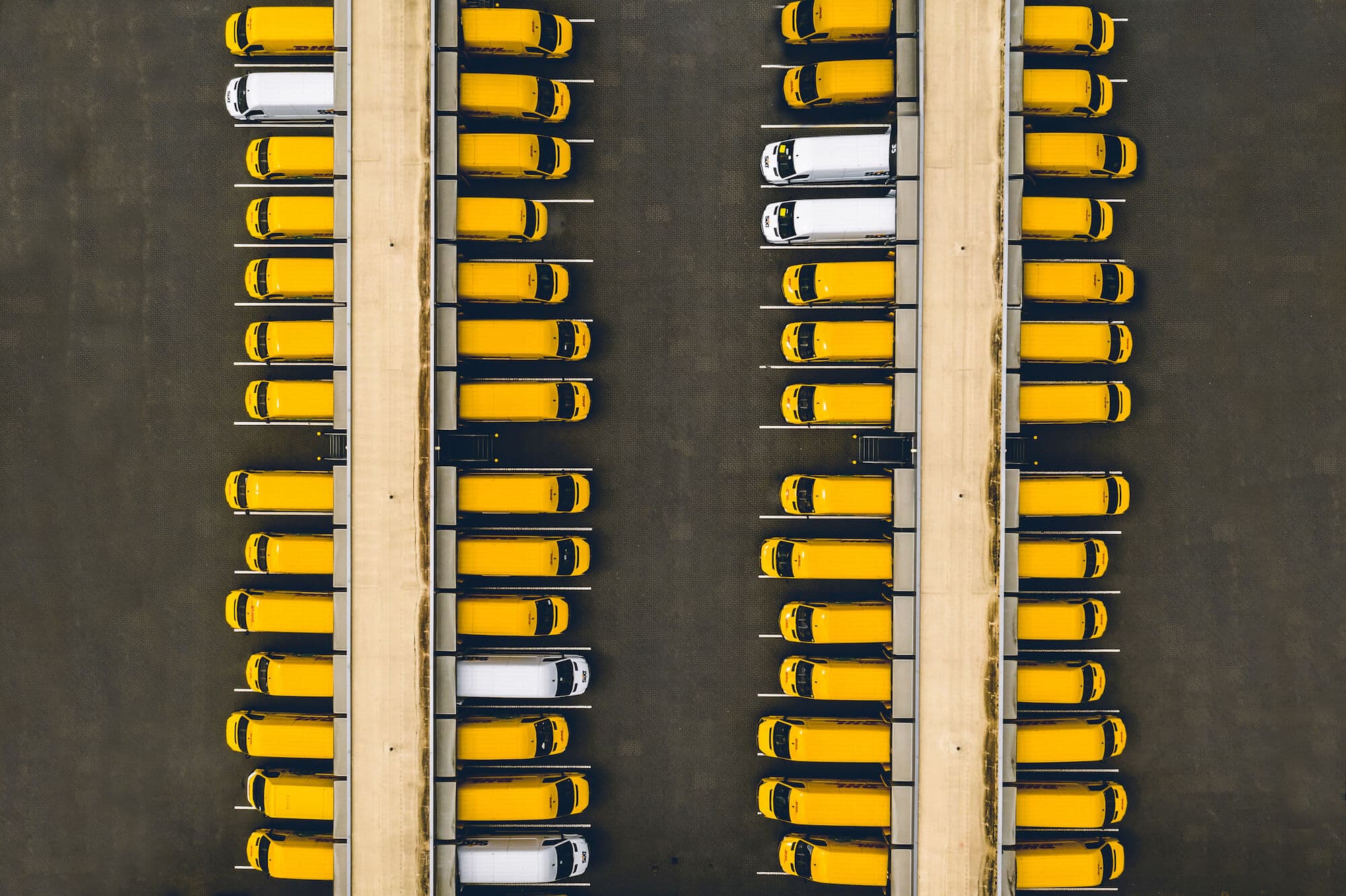 Ungraded Drone Aerial footage of vans